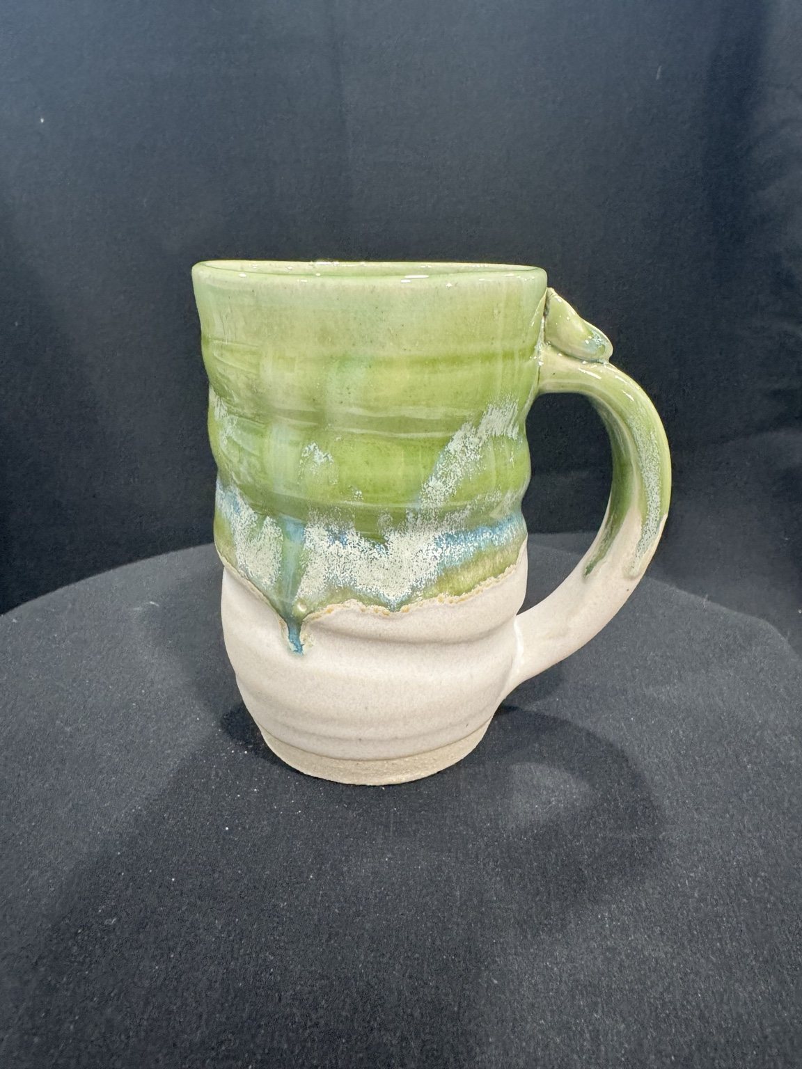 Finished green mug by DeLand Pottery