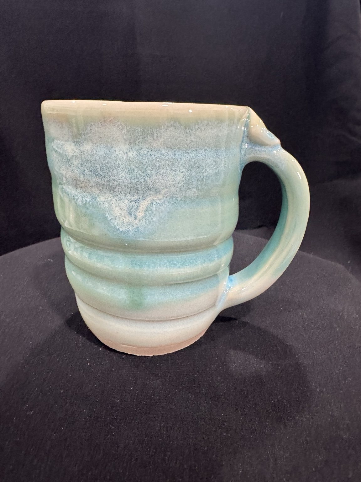 Handmade blue-green mug by DeLand Pottery